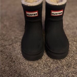 Hunter Black Boots with Cozy Lining and Distinctive Branding